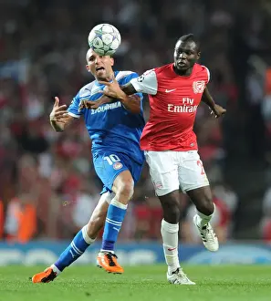 Arsenal V Olympiacos 2011-12 Prints: Arsenal's Frimpong Wins Ball from Olympiacos Djebbour in UCL Clash