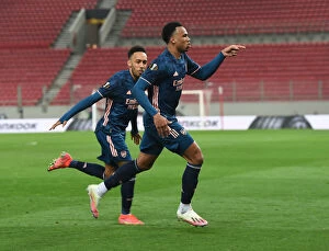 Images Dated 12th March 2021: Arsenal's Gabriel and Aubameyang Celebrate Empty Europa League Goals (Olympiacos v Arsenal 2021)
