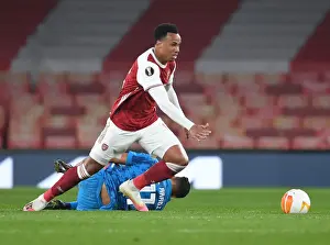 Arsenal's Gabriel in Europa League Action: Arsenal vs. Olympiacos (Behind Closed Doors)
