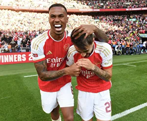 Arsenal V Manchester City - Community Shield 2023-24 Prints: Arsenal's Gabriel and Fabio Vieira Celebrate Community Shield Victory Over Manchester City
