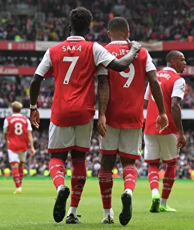 Arsenal's Gabriel Jesus and Bukayo Saka Celebrate Goals Against Tottenham in 2022-23 Premier League