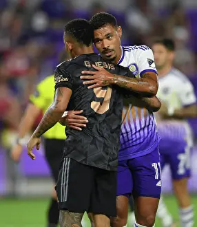 Arsenal's Gabriel Jesus Embraces Orlando City's Junior Urso in Pre-Season Friendly