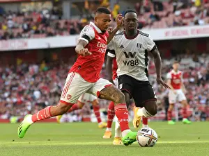 Arsenal's Gabriel Jesus Faces Off Against Fulham's Neeskens Kebano in 2022-23 Premier League Clash