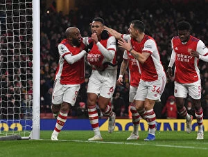 Images Dated 11th December 2021: Arsenal's Gabriel, Lacazette, and Xhaka Celebrate Goals Against Southampton (2021-22)