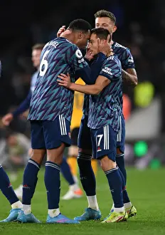 Arsenal's Gabriel Magalhaes and Cedric Soares Celebrate Victory Over Wolverhampton Wanderers in Premier League