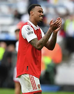 Arsenal's Gabriel Magalhaes Celebrates with Fans after Newcastle Victory, Premier League 2022-23