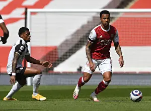 Arsenal V Fulham 2020-21 Prints: Arsenal's Gabriel Magalhaes Clashes with Fulham's Ivan Cavaleiro in Empty Emirates Stadium - Arsenal v Fulham