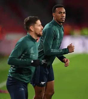 PSV Eindoven V Arsenal 2023-24 Prints: Arsenal's Gabriel Magalhaes Warming Up Ahead of PSV Eindhoven Clash in 2023-24 UEFA Champions League