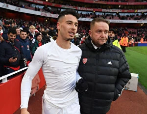 Images Dated 27th November 2021: Arsenal's Gabriel Martinelli Consoles Peter White after Arsenal vs Newcastle United Match