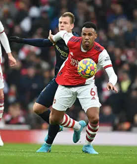 Arsenal's Gabriel Outmaneuvers Burnley's Vydra in Premier League Clash