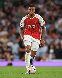 Arsenal V Manchester City 2023-24 Prints: Arsenal's Gabriel Sprints Past Manchester City: Premier League Showdown at Emirates Stadium (2023-24)