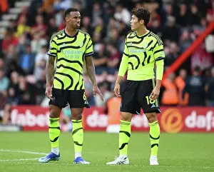 Arsenal's Gabriel and Tomiyasu in Deep Conversation during AFC Bournemouth Clash (2023-24)