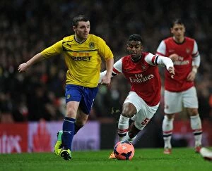 Images Dated 24th January 2014: Arsenal's Gedion Zelalem Closes Down Coventry's John Fleck in FA Cup Fourth Round