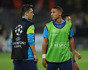 Arsenal's Gibbs and Ozil Prepare for Borussia Dortmund Clash in UEFA Champions League