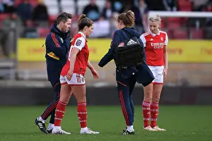 Tottenham Hotspur Women V Arsenal Women 2022-23 Prints: Arsenal's Gio Queiroz Receives Medical Treatment During Tottenham vs Arsenal Women's Super League Match
