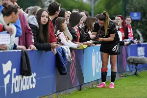 Arsenal's Gio Queiroz Signs Autographs after Everton vs Arsenal Women's Super League Match
