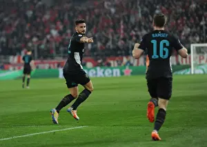 Arsenal's Giroud and Ramsey Celebrate Goal in UEFA Champions League against Olympiacos