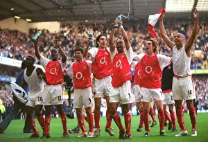 Arsenal's Glory: Celebrating Victory Over Tottenham at White Hart Lane, 2004