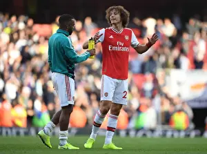 Arsenal's Glory: Lacazette and Luiz Celebrate Derby Victory over Tottenham (2019-20)