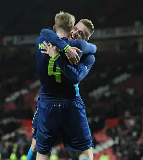 Manchester United V Arsenal 2014-15 Prints: Arsenal's Glory: Mertesacker and Chambers Celebrate FA Cup Quarterfinal Victory over Manchester United