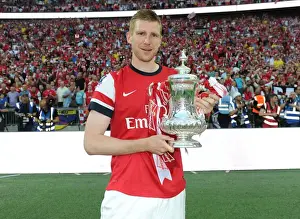 Arsenal V Hull City - FA Cup Final 2014 Prints: Arsenal's Glory: Per Mertesacker's FA Cup Victory Celebration (2014)