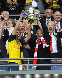 Arsenal's Glory: Monreal and Wenger Lift FA Cup After Arsenal's Victory over Aston Villa