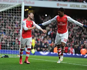 Arsenal V Aston Villa 2014-15 Prints: Arsenal's Glory: Santi Cazorla and Chuba Akpom Celebrate Fourth Goal vs