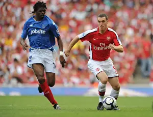 Arsenal V Portsmouth 2009-10 Prints: Arsenal's Glory: Vermaelen and Kanu's Unforgettable Victory Celebration (4-1 vs Portsmouth)