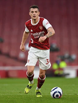 Images Dated 21st February 2021: Arsenal's Granit Xhaka in Action: 2021 Premier League Match vs. Manchester City at Emirates Stadium