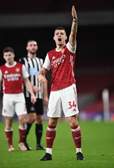 Arsenal's Granit Xhaka in Action against Newcastle United at Emptied Emirates Stadium (Premier League 2020-21)