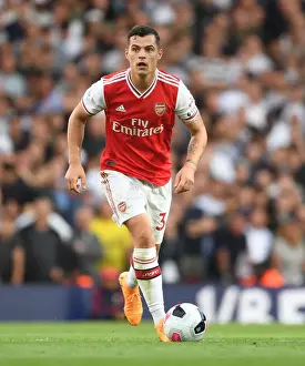 Arsenal's Granit Xhaka in Action Against Tottenham in the 2019-20 Premier League