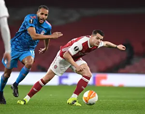 Arsenal's Granit Xhaka Battles Past Olympiacos in Empty Emirates Stadium - UEFA Europa League Round of 16