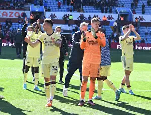 Arsenal's Granit Xhaka and Bernd Leno Celebrate Hard-Fought Victory over Aston Villa in Premier League Showdown