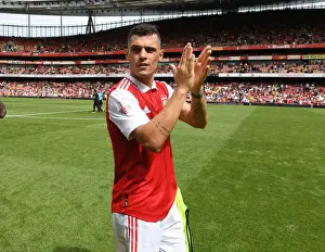 Arsenal's Granit Xhaka Celebrates with Fans after Arsenal v Sevilla Pre-Season Victory