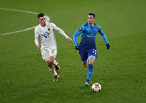 Arsenal V Östersunds FK 2017-18 Prints: Arsenal's Granit Xhaka Clashes with Östersunds Jamie Hopcutt in Europa League Showdown