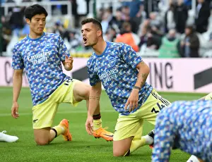 Arsenal's Granit Xhaka Gears Up for Newcastle United Clash in Premier League Showdown