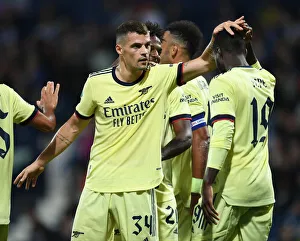 West Bromwich Albion V Arsenal - Carabao Cup 2021-22 Prints: Arsenal's Granit Xhaka and Nicolas Pepe Celebrate Goals in Carabao Cup Win Against West Bromwich Albion
