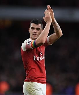 Images Dated 2nd December 2018: Arsenal's Granit Xhaka Rallies Fans After Arsenal v Tottenham Premier League Clash