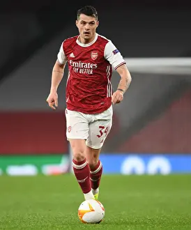 Arsenal's Granit Xhaka in UEFA Europa League Action Against Olympiacos (Behind Closed Doors)