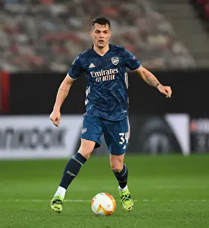 Arsenal's Granit Xhaka in UEFA Europa League Action Against Olympiacos in Empty Karaiskakis Stadium