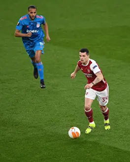 Arsenal's Granit Xhaka in UEFA Europa League: A Lone Warrior Amidst Empty Seats vs. Olympiacos