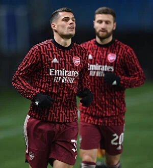 Images Dated 26th November 2020: Arsenal's Granit Xhaka Warms Up Ahead of Molde FK Clash in Europa League