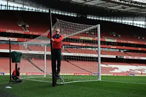Arsenal's Groundsman Prepares the Emirates Pitch for Arsenal vs Bournemouth (2015-16)