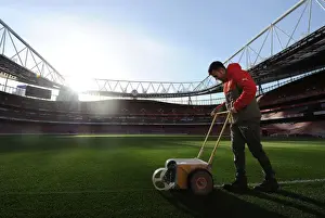 Arsenal V West Bromwich Albion 2016-17 Prints: Arsenal's Groundsman Prepares the Pitch for Arsenal v West Bromwich Albion (2016-17)