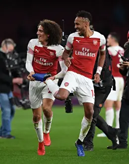 Arsenal V Tottenham Hotspur 2018-19 Prints: Arsenal's Guendouzi and Aubameyang Celebrate Victory Over Tottenham