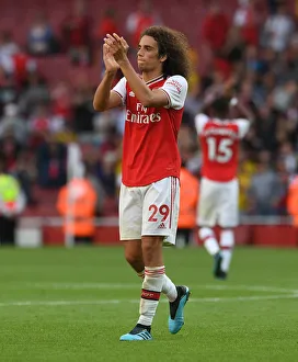 Arsenal V Tottenham Hotspur 2019-20 Prints: Arsenal's Guendouzi Celebrates with Fans after Arsenal vs