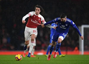 Arsenal v Cardiff City 2018-19 Collection: Arsenal's Guendouzi Clashes with Cardiff's Paterson in Premier League Showdown