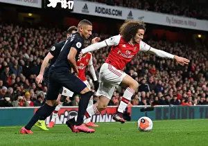 Arsenal V Everton 2019-20 Prints: Arsenal's Guendouzi Clashes with Everton's Richarlison in Premier League Showdown