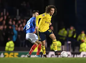 Portsmouth V Arsenal FA Cup 5th Rd 2020 Prints: Arsenal's Guendouzi Clashes with Portsmouth's Close in FA Cup Fifth Round