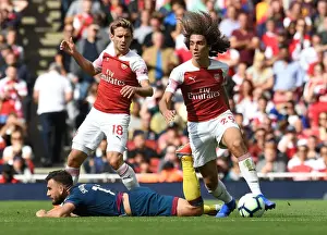 Arsenal V West Ham United 2018-19 Prints: Arsenal's Guendouzi Clashes with West Ham's Snodgrass in Premier League Showdown